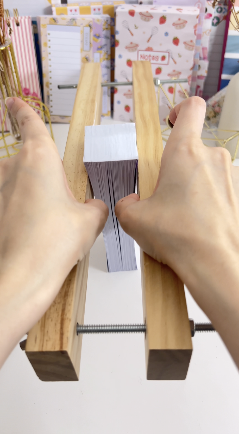 The glued block left to dry with the spine pressed flat