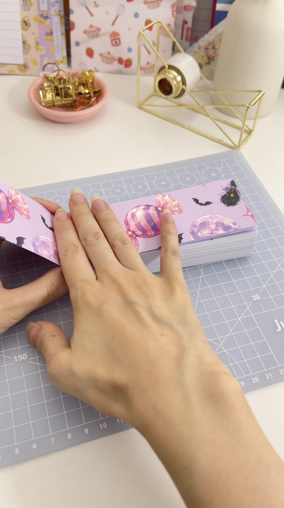 Gluing the front cover onto the first page of the planner block